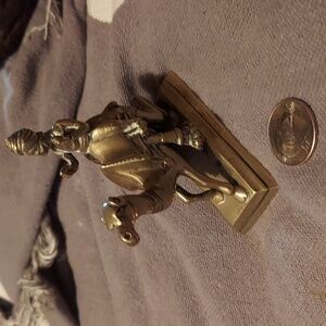 Antique brass traveling Wiseman on camels back.